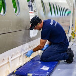 Engineer working on an Airbus Aircraft ordered by Qantas. Photo (courtesy).