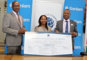 Global Compact Network Kenya Executive Director Judy Njino, Sanlam Kenya PLC Group CEO Dr. Patrick Tumbo (Left) and George Kuria, CEO Sanlam General Insurance Kenya (left) during 
the official certificate handover welcoming Sanlam Kenya PLC to the UN Global Compact. Image:courtesy.